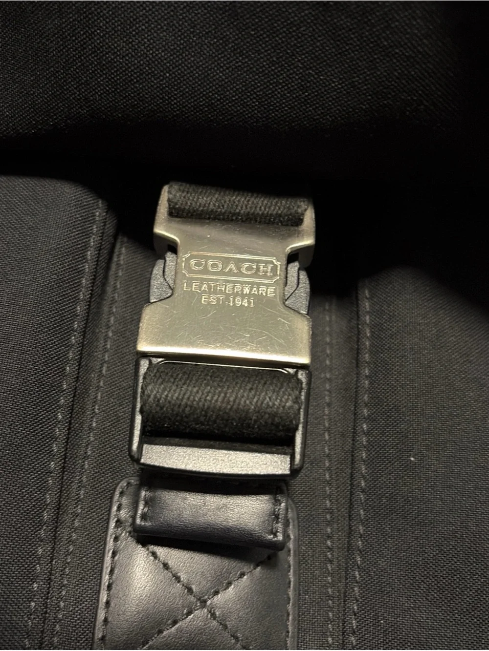 Coach sleek black